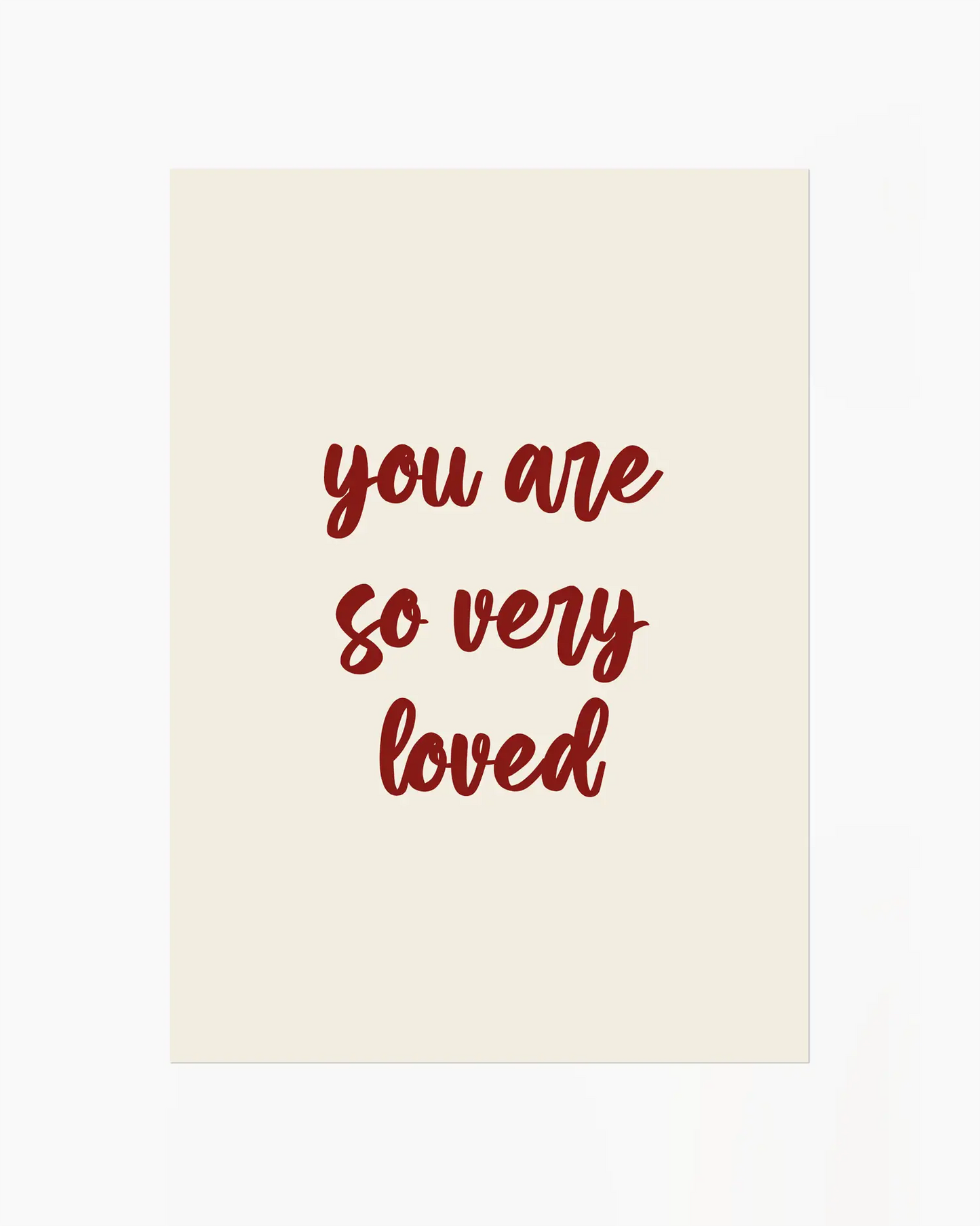 Nursery poster with red 'you are so very loved' text on a beige background.