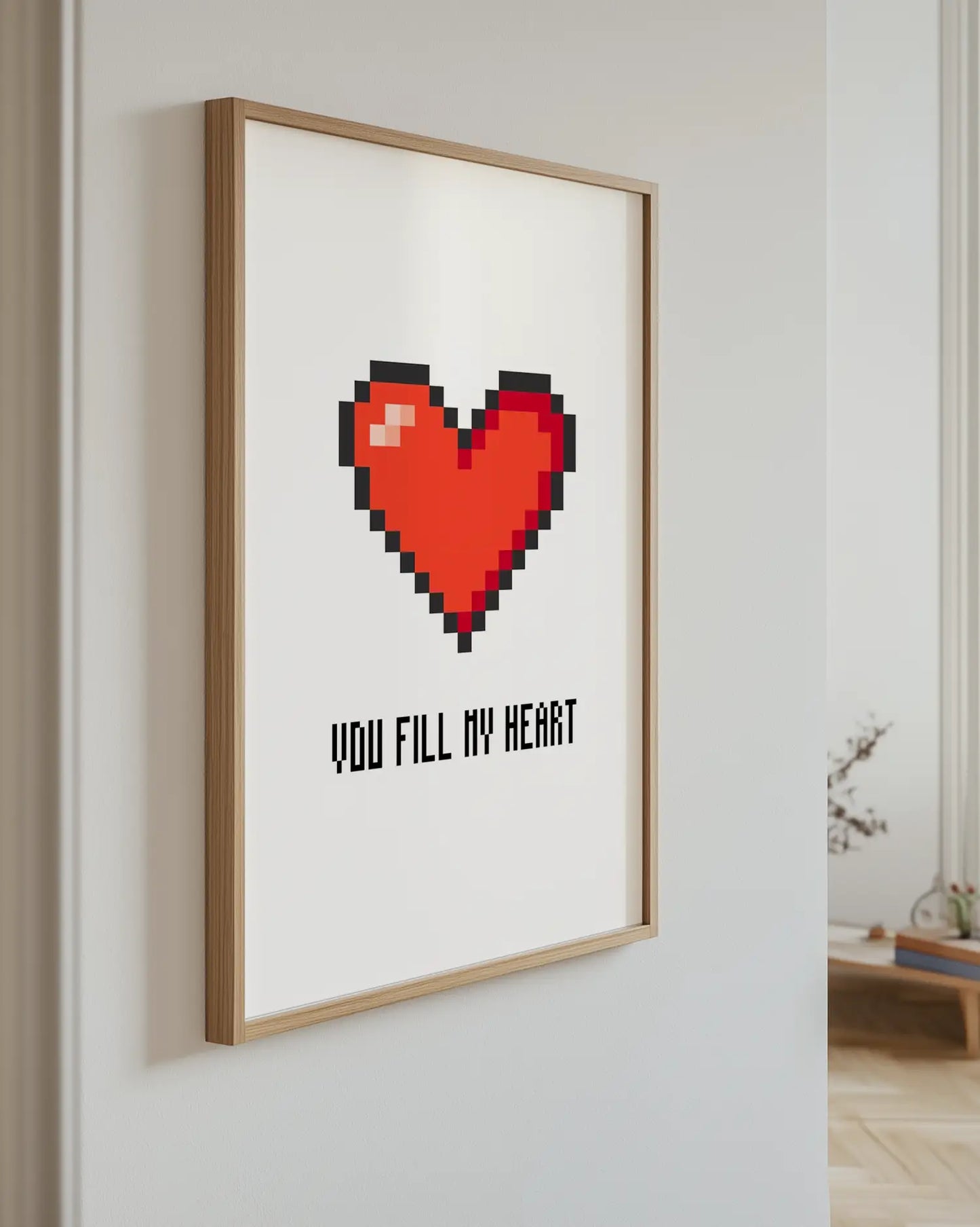 Poster with a red heart and the text "You fill my heart" on the wall