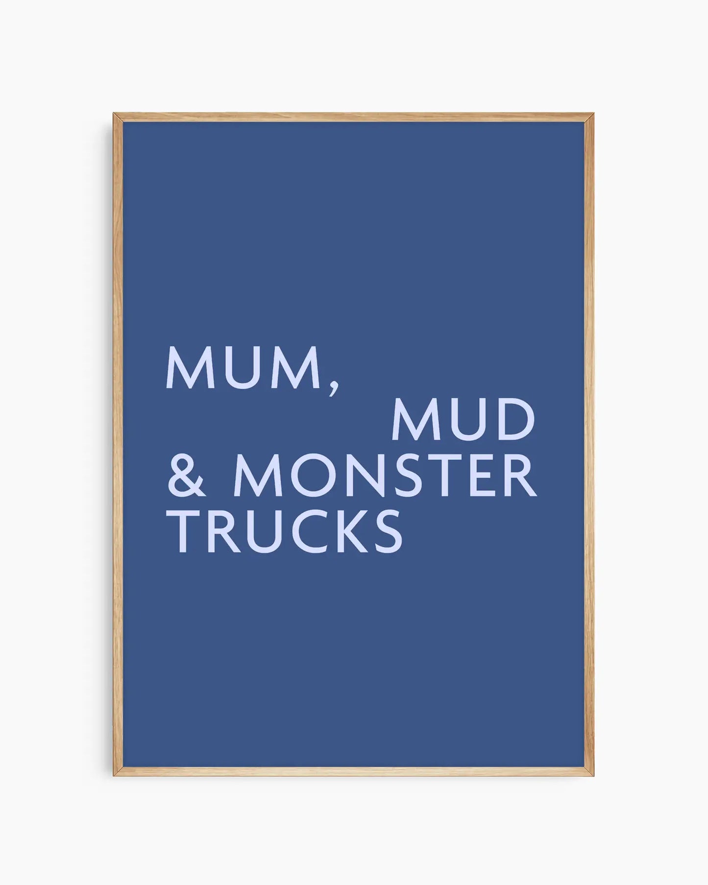 Poster with light blue text 'MUM, MUD & MONSTER TRUCKS' on a dark blue background in an oak wooden frame.
