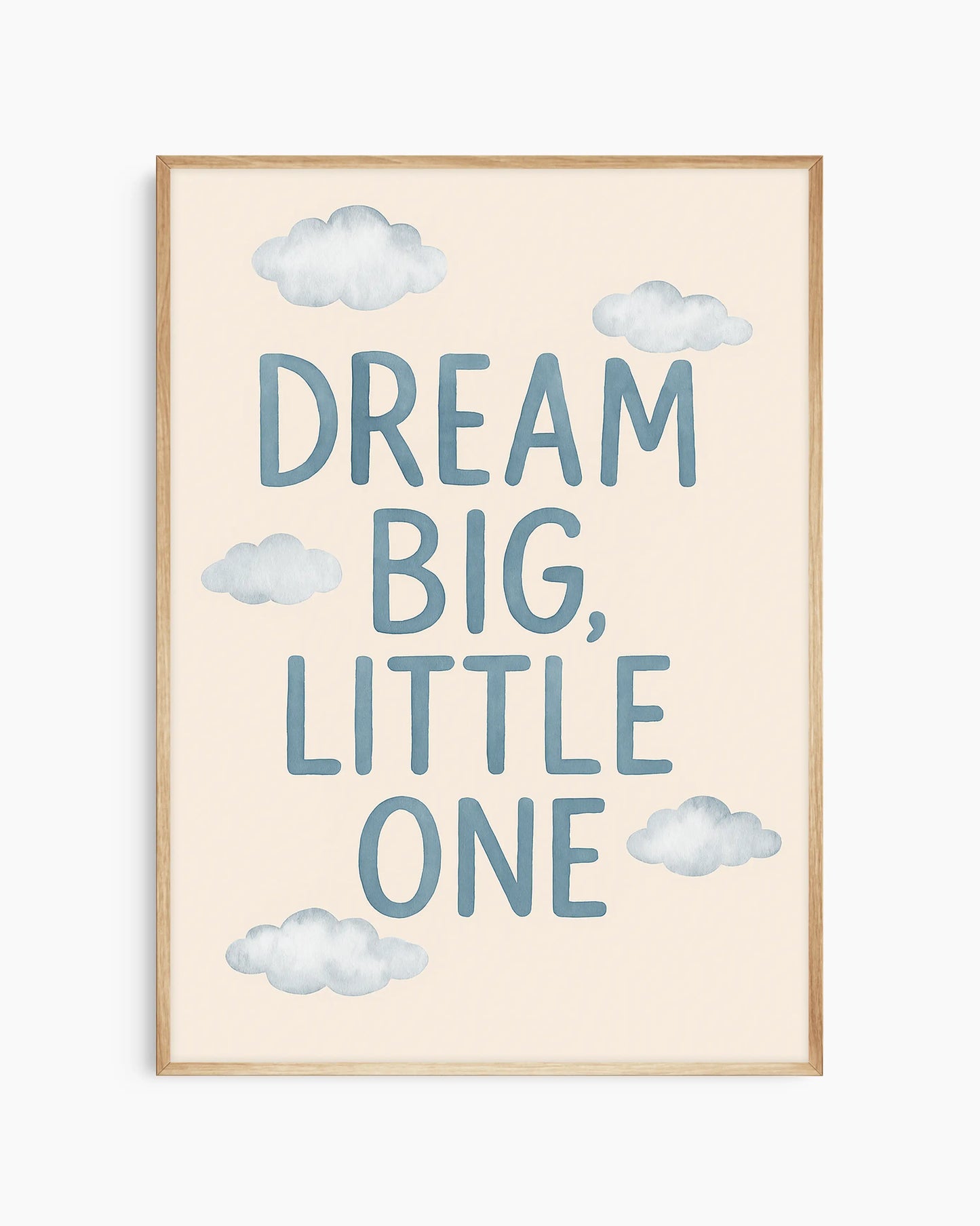 Framed artwork with 'Dream Big, Little One' text and cloud illustrations on a light background