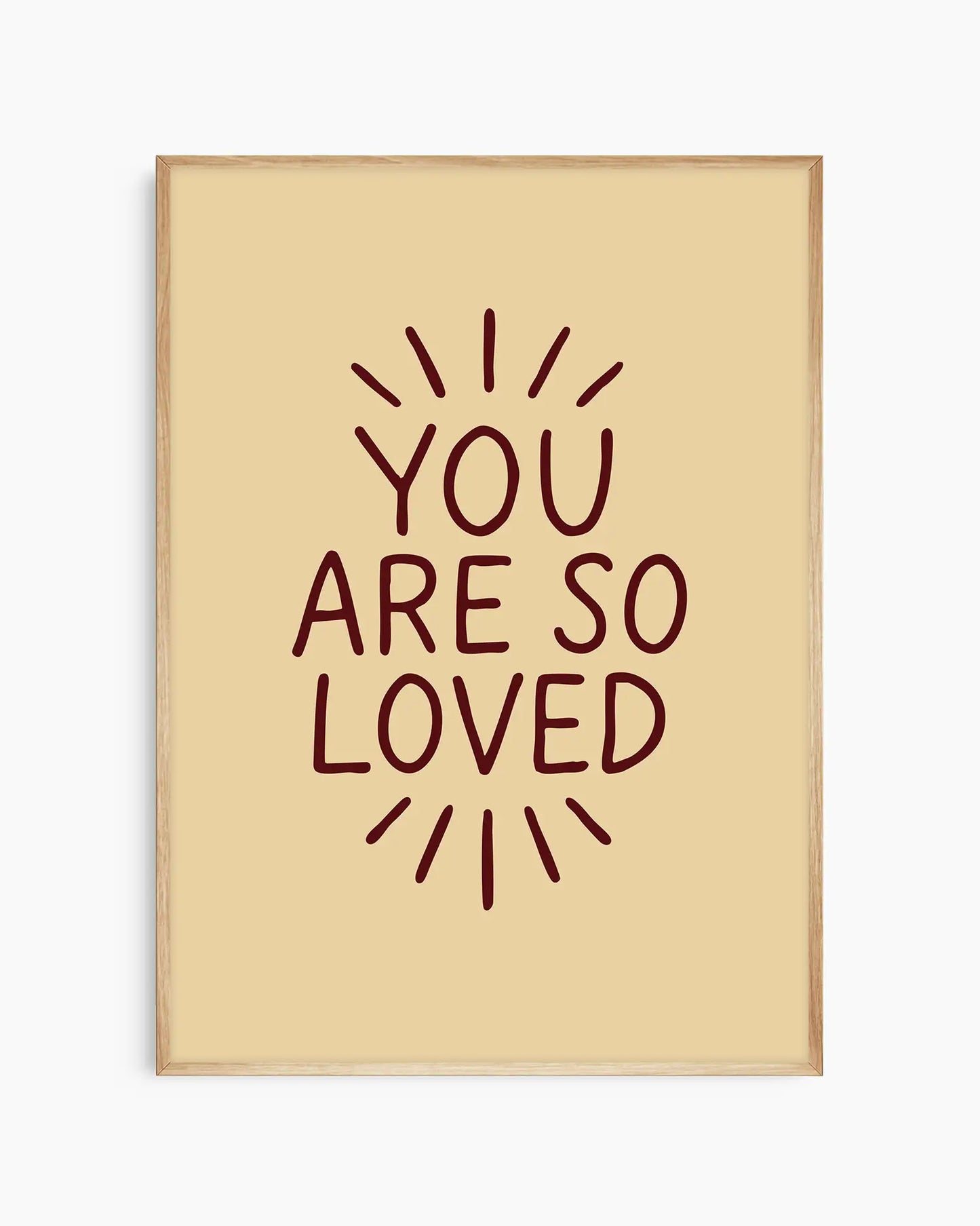 Children's poster with 'You are so loved' text framed in an oak frame.