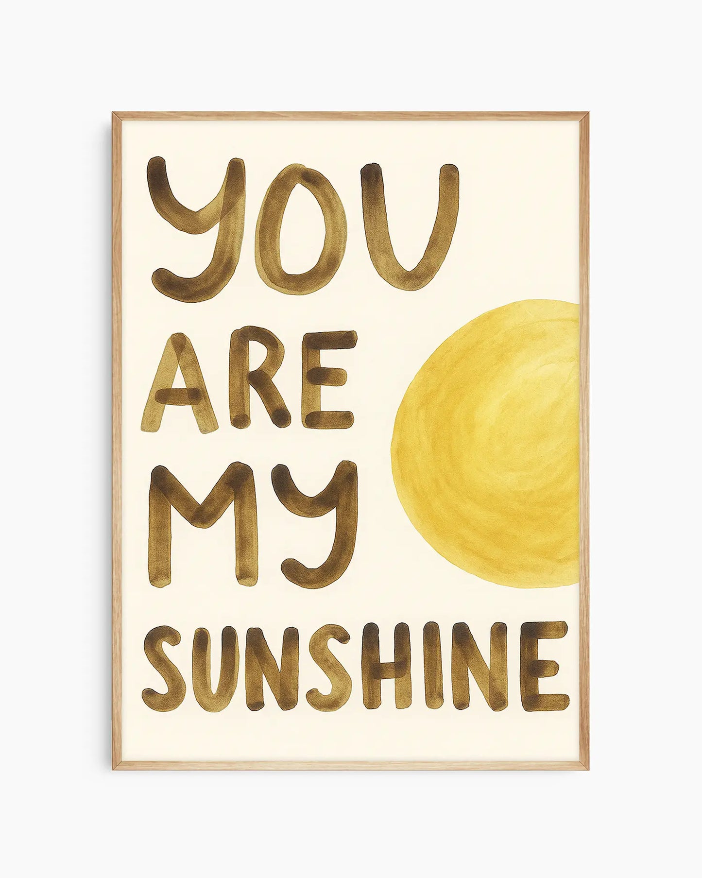 Poster with 'You are my sunshine' text and a sun illustration on a beige background framed in an oak frame.