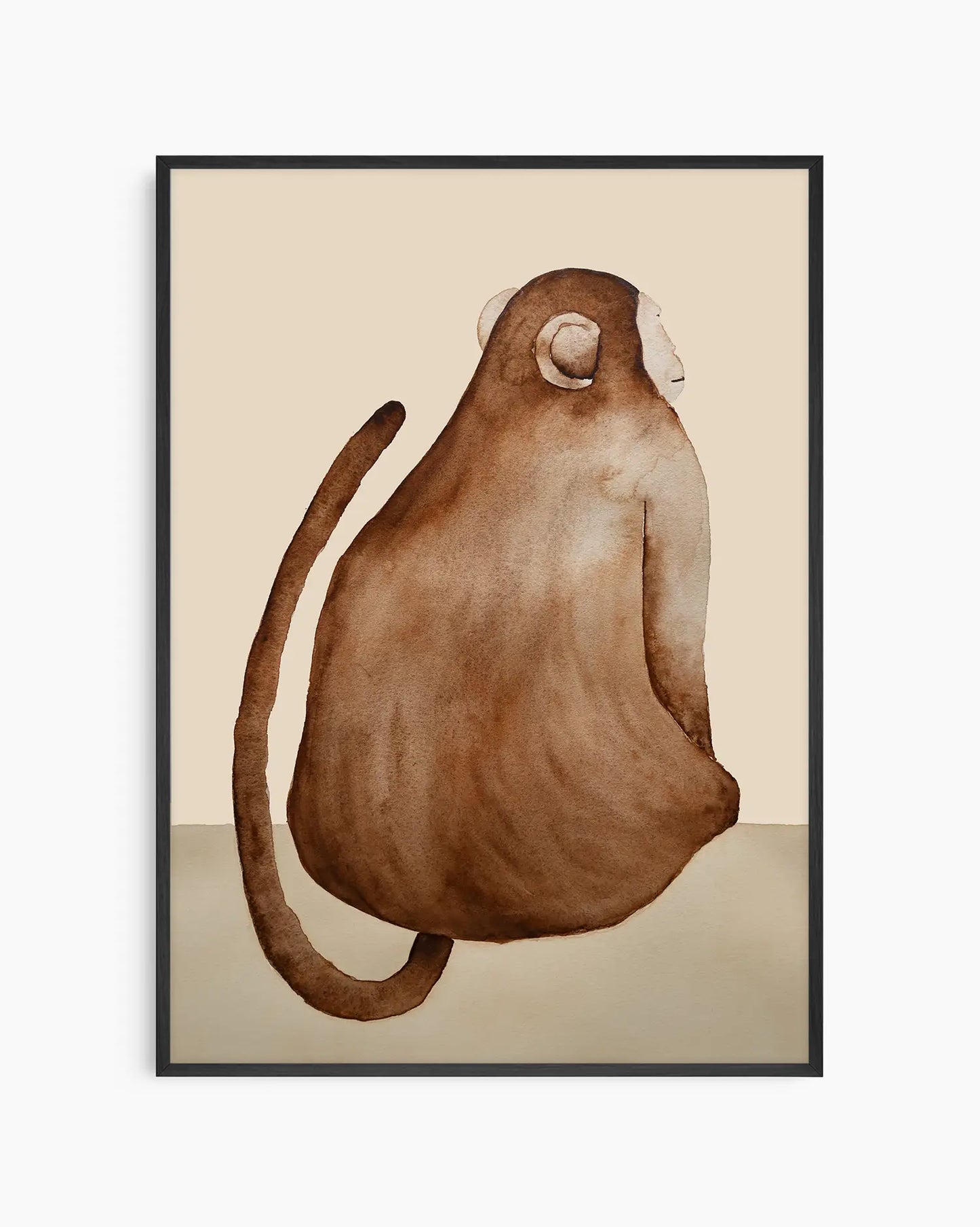 Nursery poster of a brown monkey on a beige background inside of a black wooden frame.
