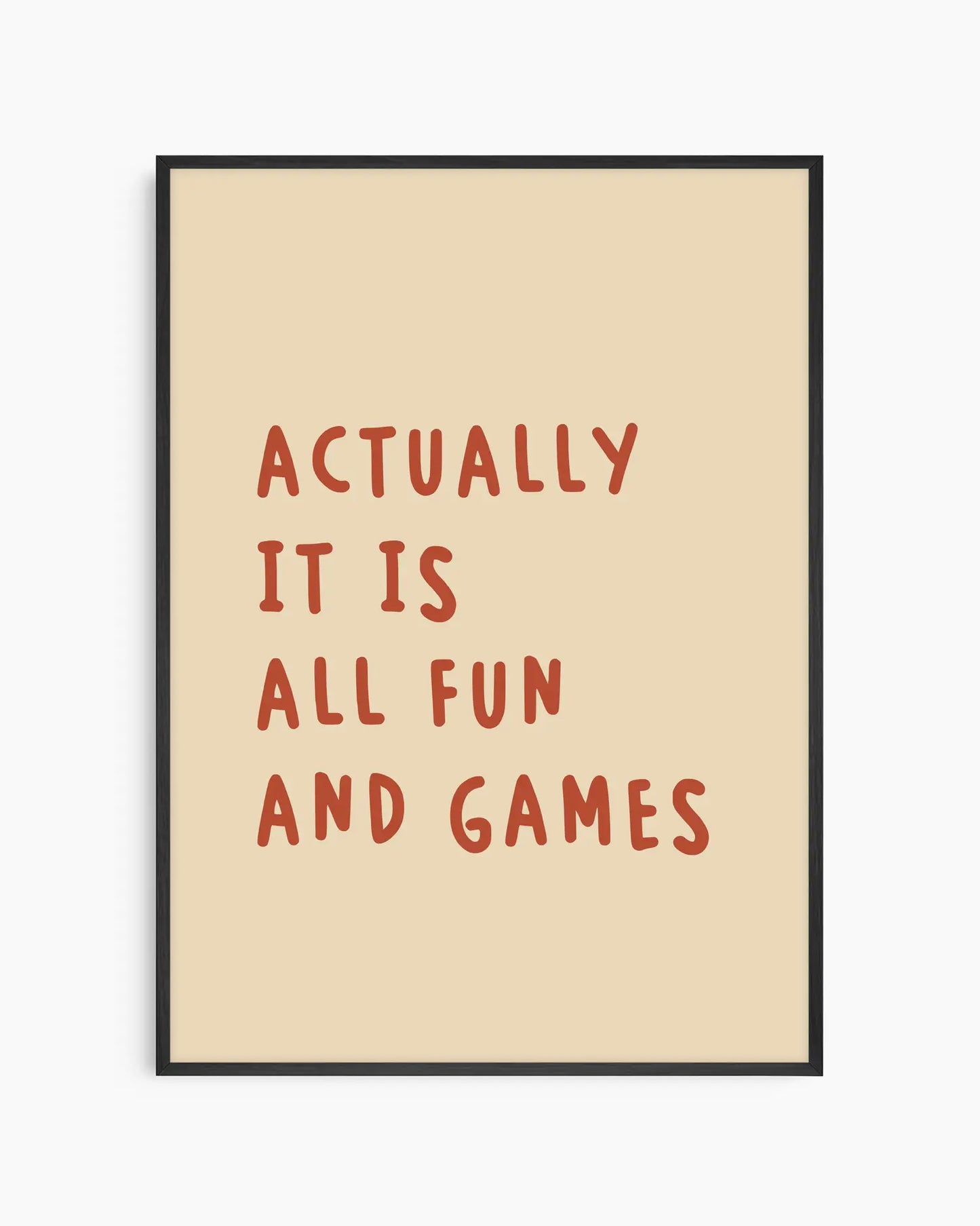 Beige nursery poster with the text 'Actually it is all fun and games'  framed in a black wooden frame