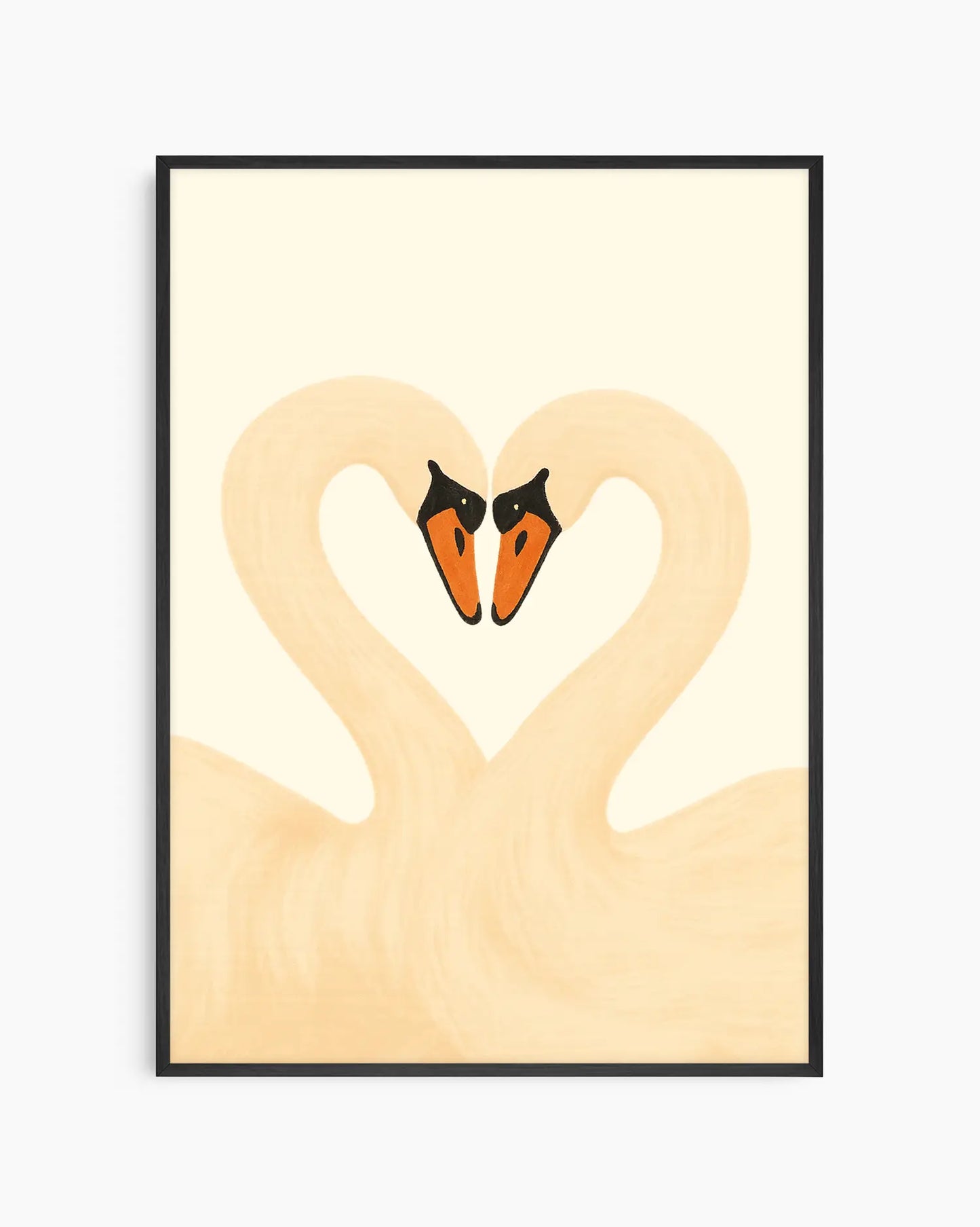 Framed artwork of two swans forming a heart on a light background