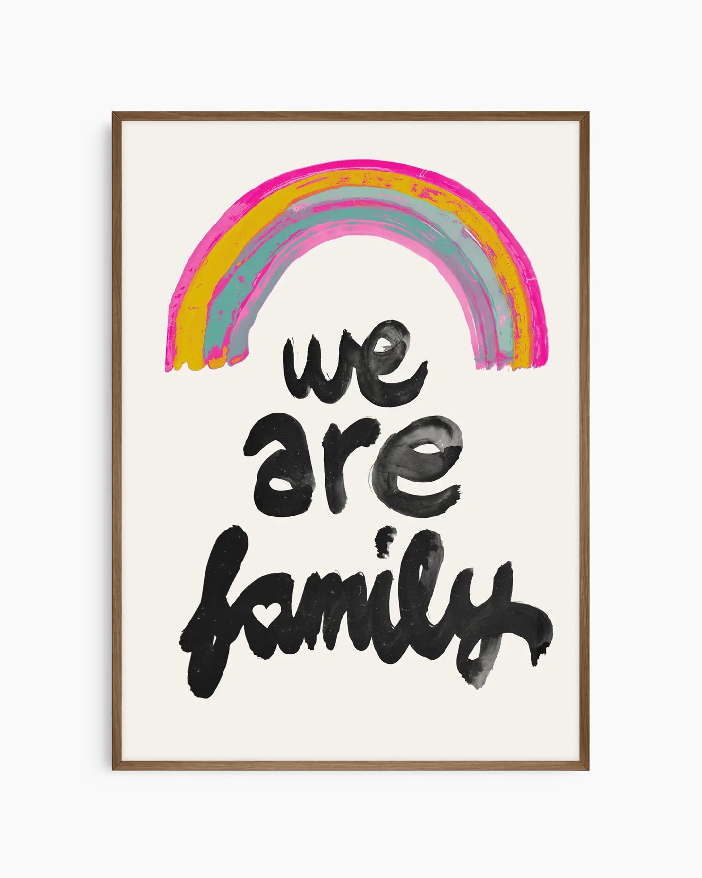 Framed artwork with a rainbow and 'we are family' text on a white background