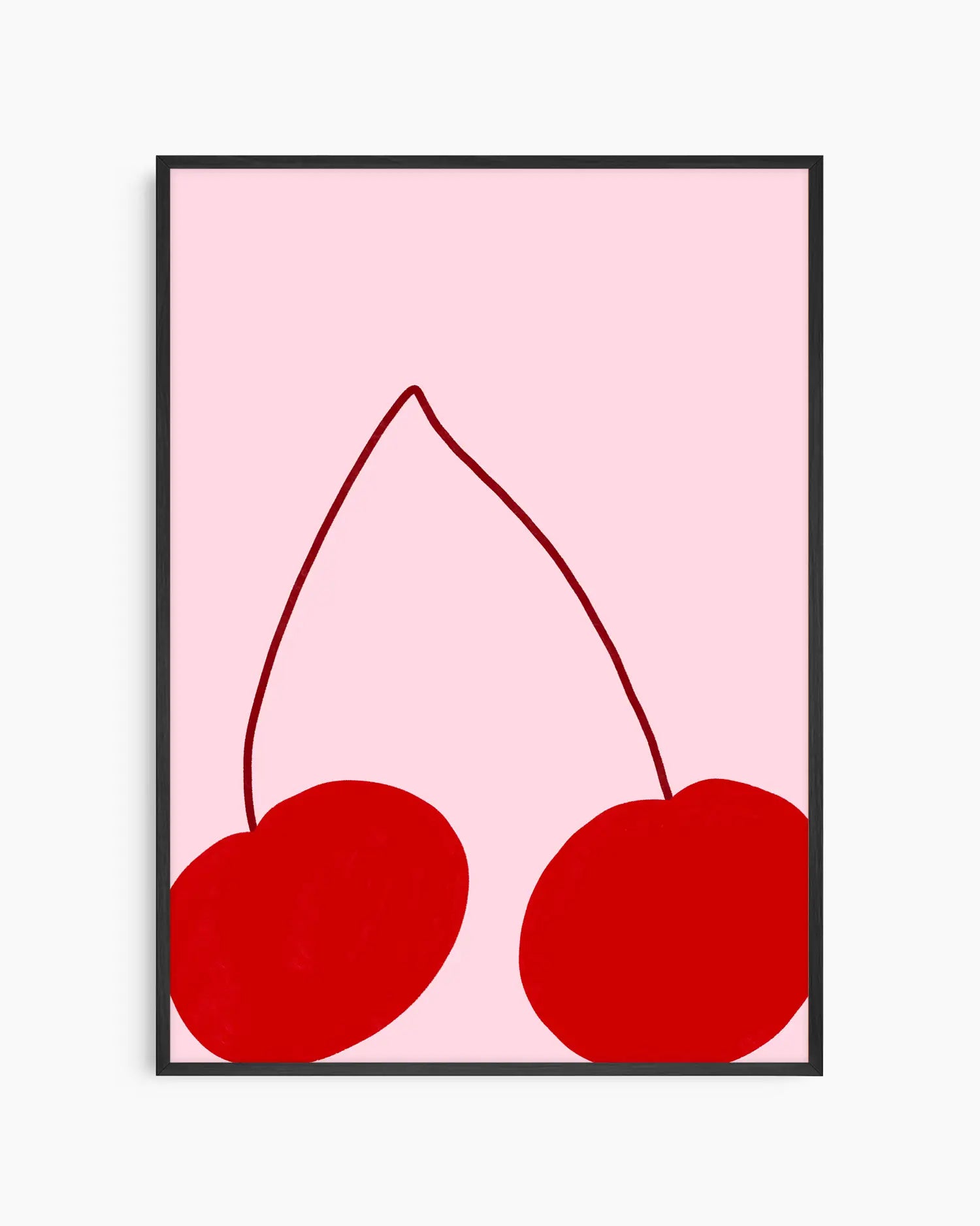 Framed artwork of two red cherries on a pink background