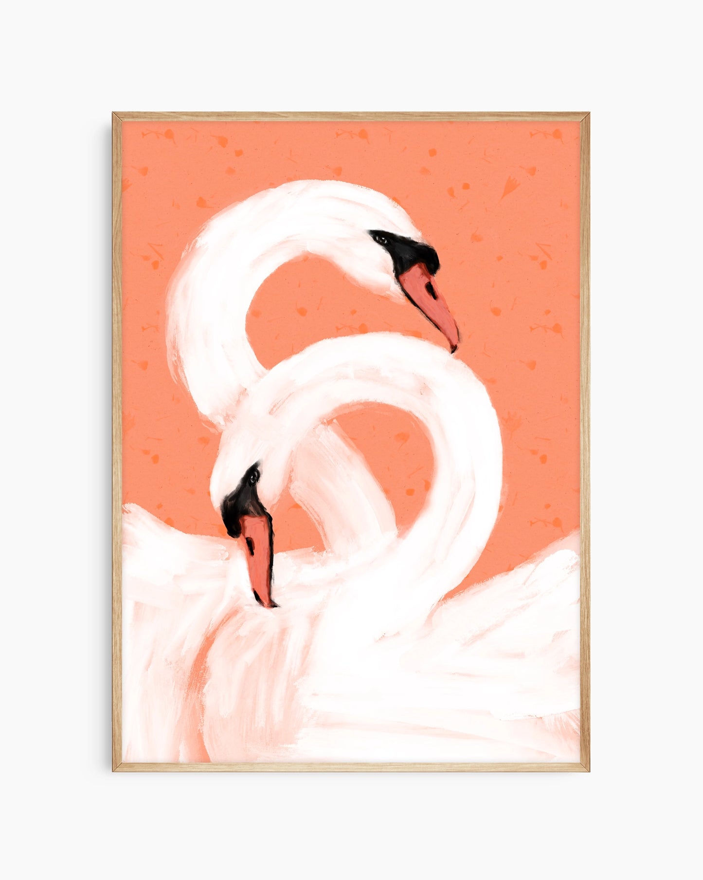 Framed artwork of two swans on a coral background