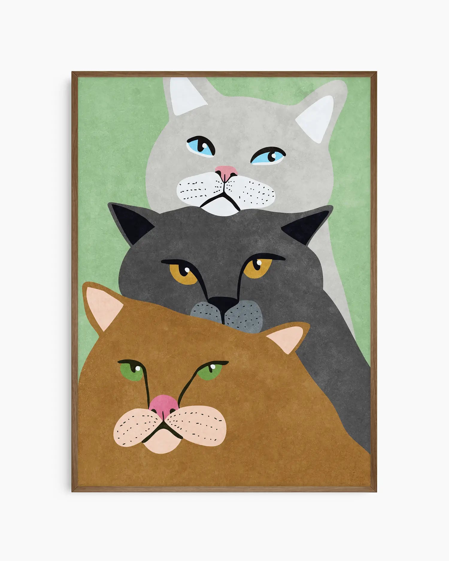 Framed artwork of three cats with different colors and expressions on a green background.