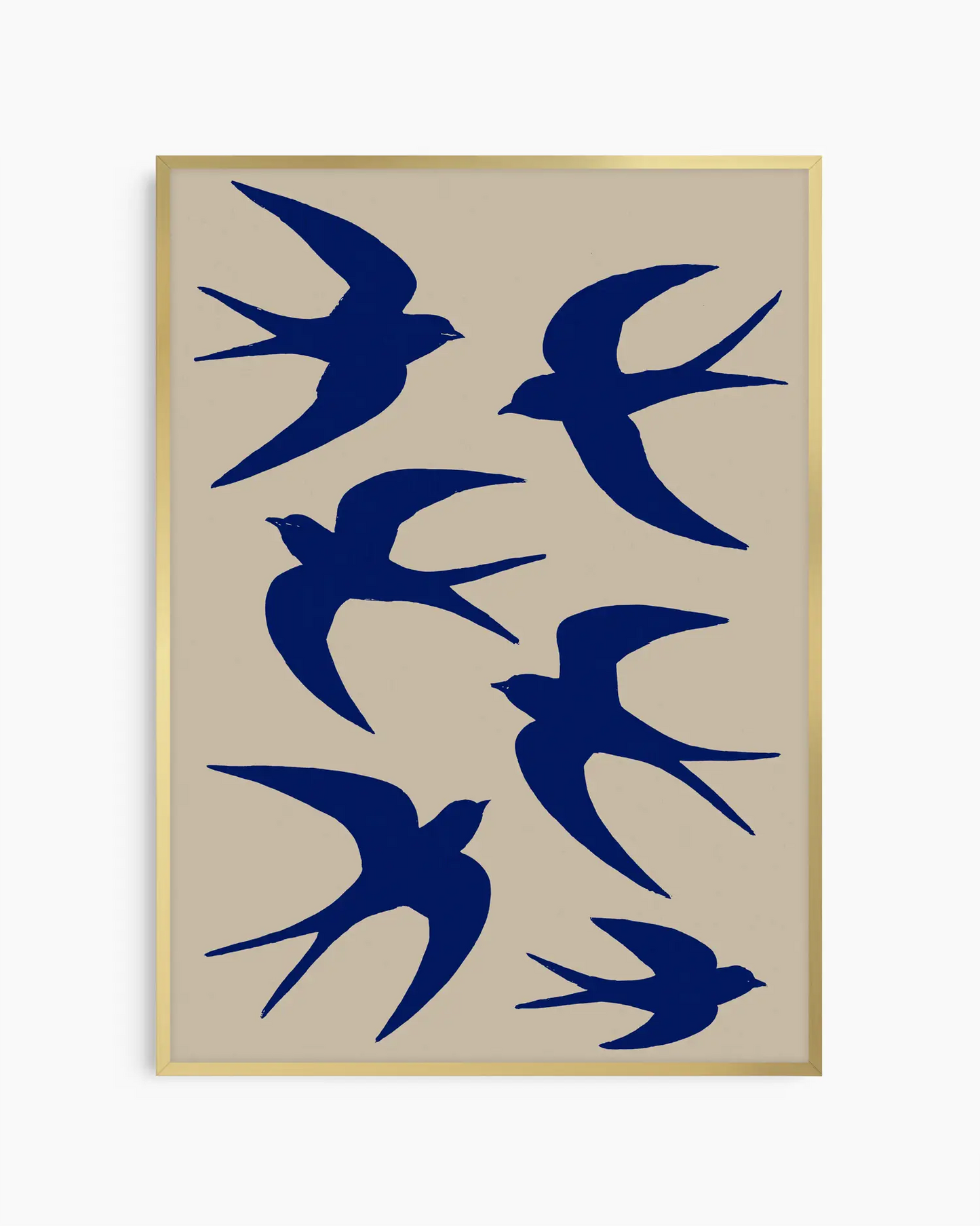Framed artwork with blue bird silhouettes on a beige background